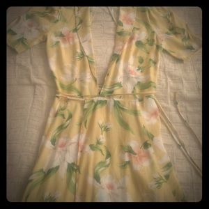 The Reformation yellow floral print wrap dress